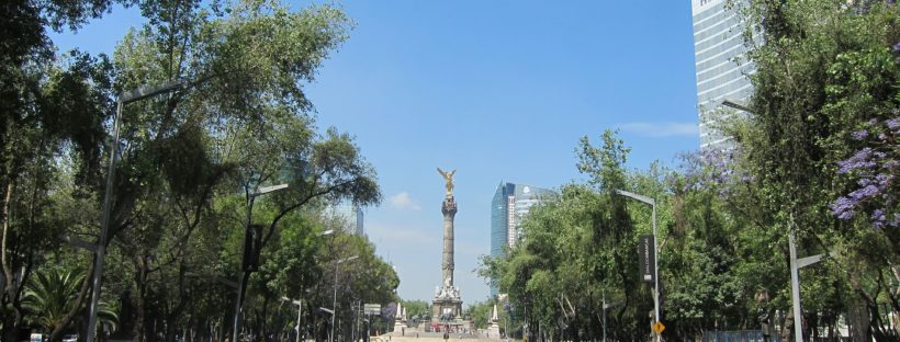 every Sunday Paseo de la Reforma closed to motor vehicles. People ride their bikes on the multi-lane road.